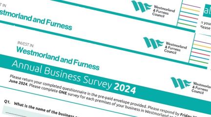 Copies of the annual business survey on top of each other.