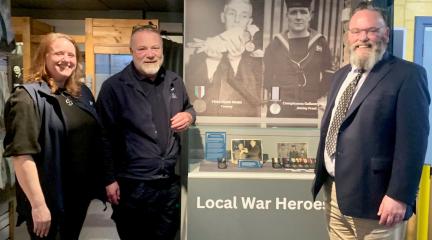 Charlotte Hawley, John Irving from the Dock Museum with Paul Laidlaw the auctioneer.