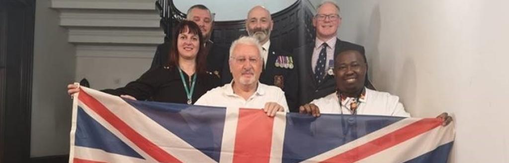 Pictured are Andy Picket, Royal British Legion Standard Bearer; Andy Edgar, RBL bugler and Chris Maycock, RBL Kendal branch Chair. W&F Armed Forces Lead Officer Linda Jones; veteran Brian Cooper and the council’s Deputy Chair Cllr Ali Jama.