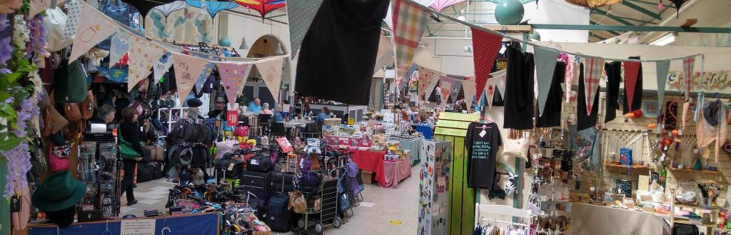 Stalls in an indoor market.