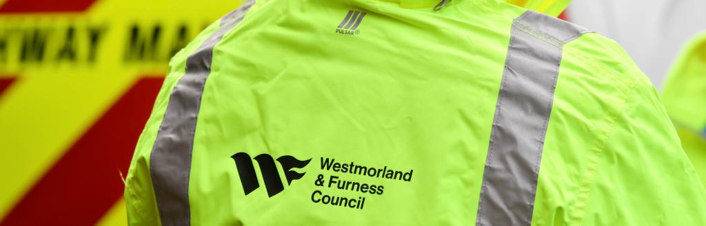 Back of a high visibility jacket branded Westmorland and Furness Council