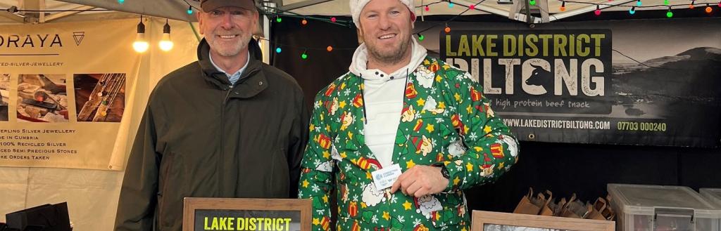 Jonathan Harris, programme director for Connecting Cumbria, and Bryan Mol of Lake District Biltong at his stall at Bowness Glebe Market.