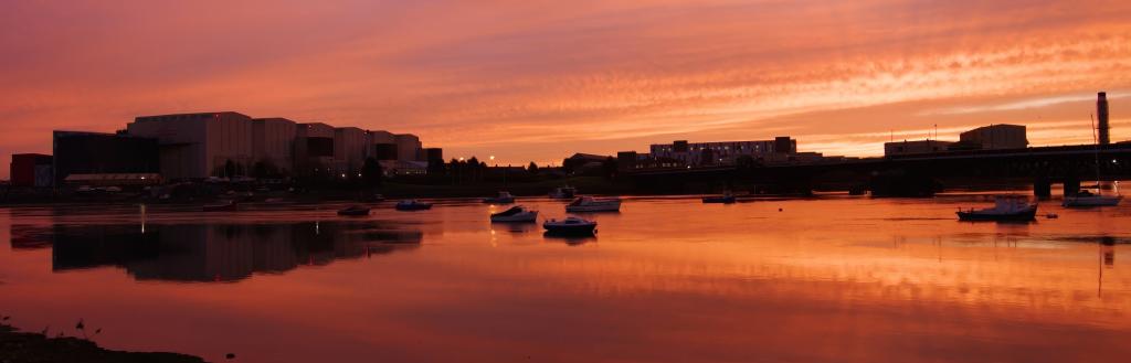 Sunset looking over Walney Channel towards Devonshire Dock Hall.